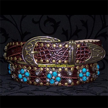 Turquoise and crystals on brown leather